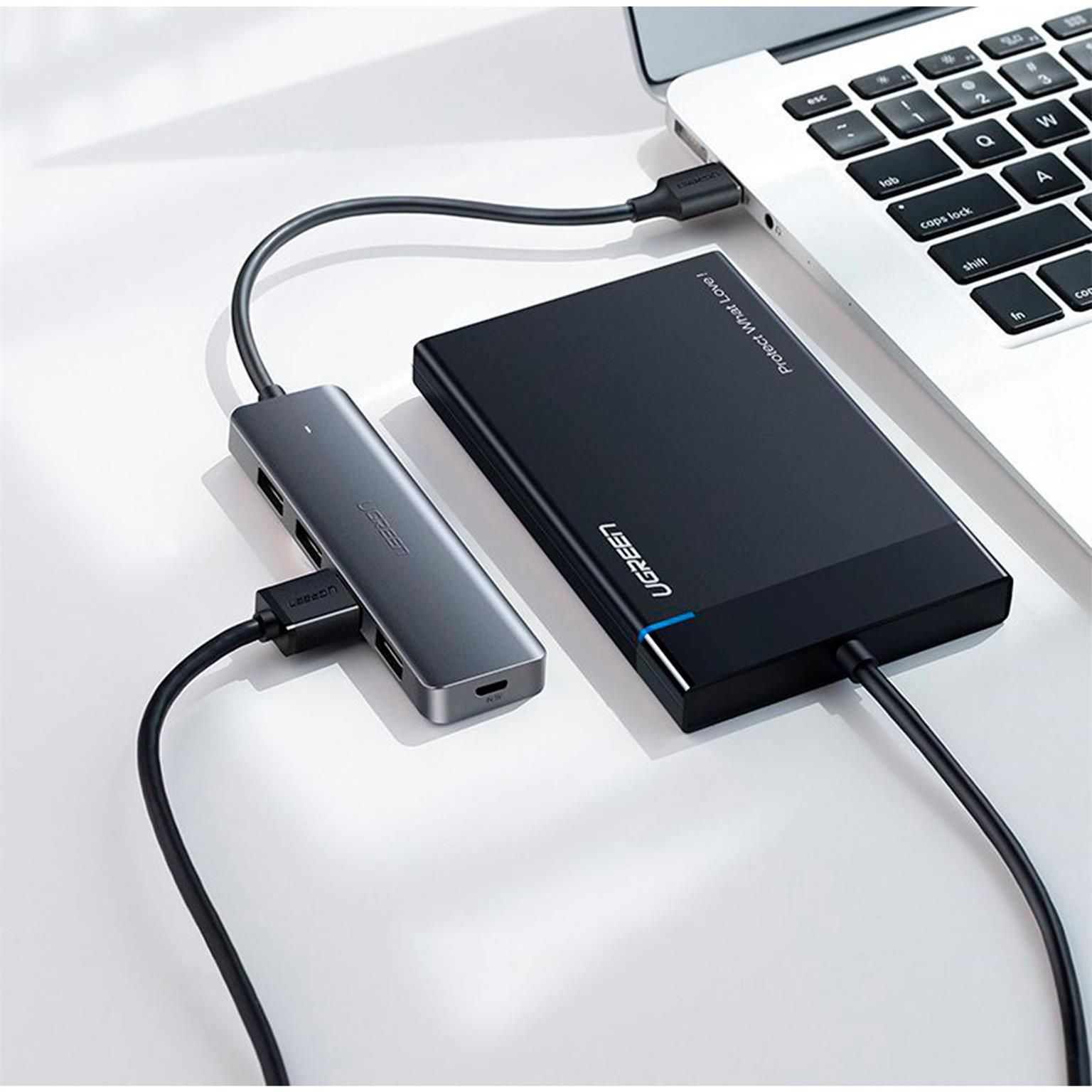 Ugreen USB-Hub – 4x USB-A 3.2 Ports, für Tablets und andere Geräte, Micro-USB Stromanschluss, USB-C Stecker – Weiteres Produktbild 3 Ugreen USB-Hub – 4x USB-A 3.2 Ports, für Tablets und andere Geräte, Micro-USB Stromanschluss, USB-C Stecker – Weiteres Produktbild 3